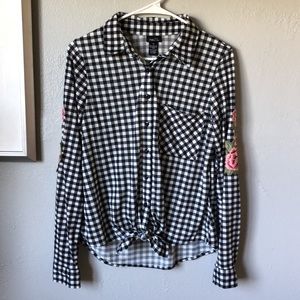 Rue21 size M checkered with floral patches on both long sleeve. Button up